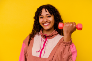 Person exercising for weight loss and overall wellness with support from Flow Wellness