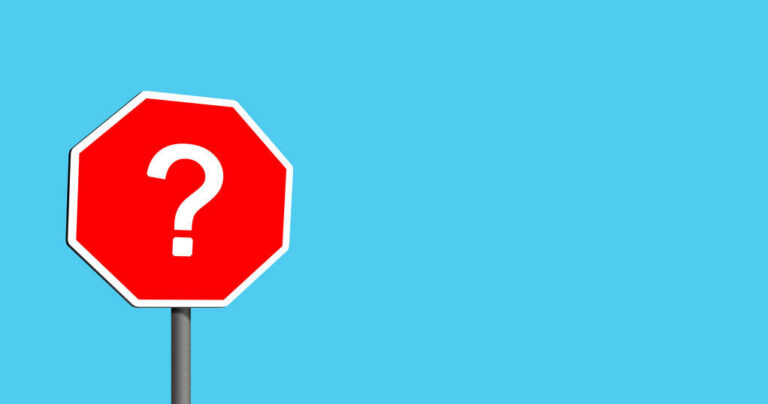 A red octagonal stop sign shape with a white question mark on a bright blue background