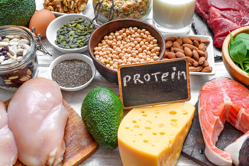 High-protein foods supporting weight loss and muscle health, highlighting protein intake for metabolism and satiety at Flow Wellness