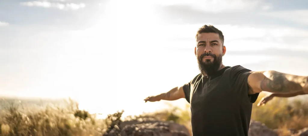 Man stretching outdoors to improve flexibility and overall health