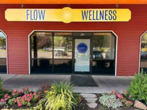 Entrance to Flow Wellness Bend located in the Old Mill overlooking the Deschutes River