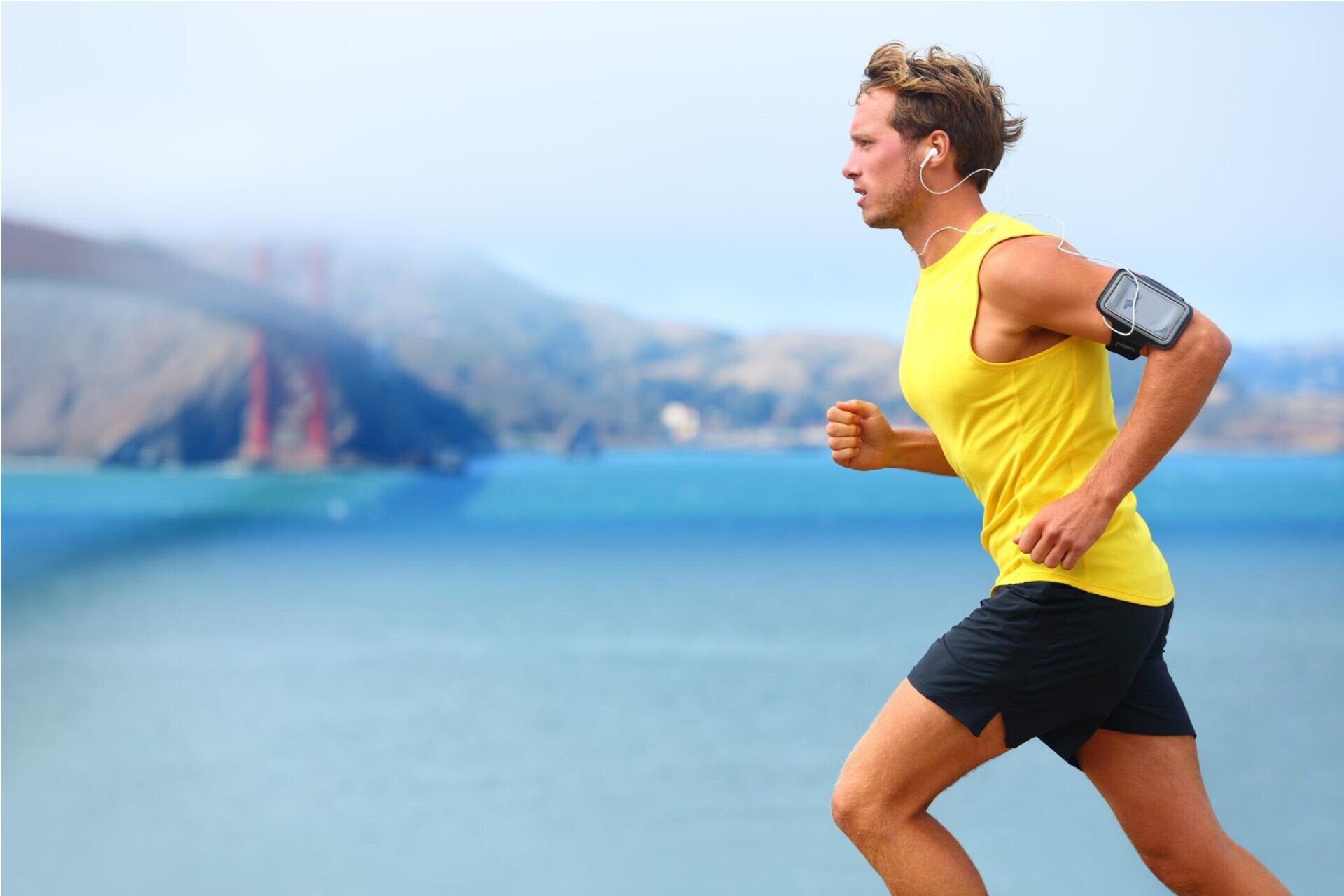 Person running outdoors representing energy and performance support at Flow Wellness