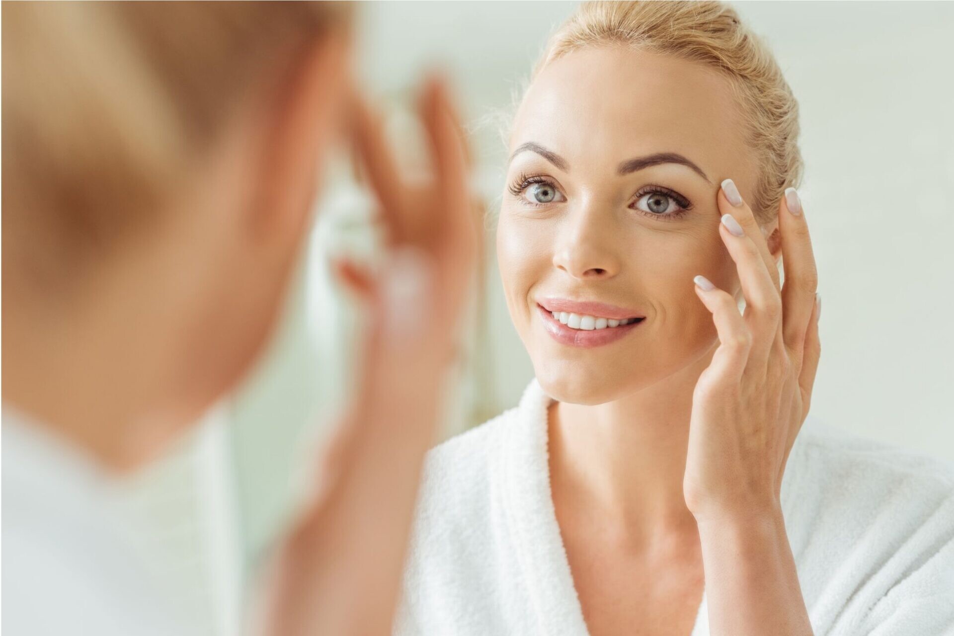Close-up of a woman's skin representing biotin IV therapy for skin and hair health at Flow Wellness
