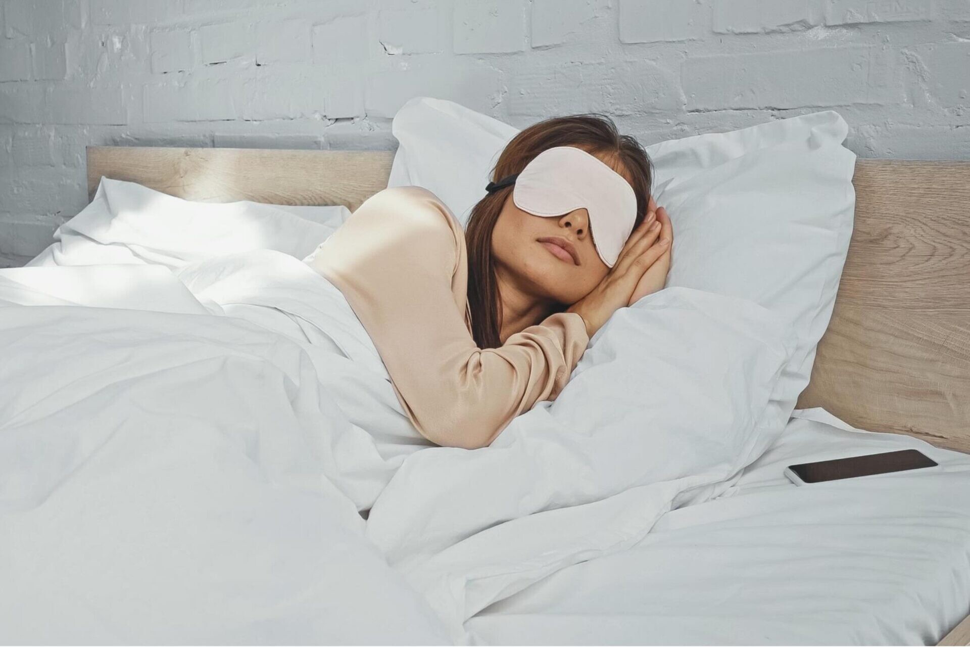 Woman resting peacefully after finding relief from migraine symptoms with IV therapy at Flow Wellness