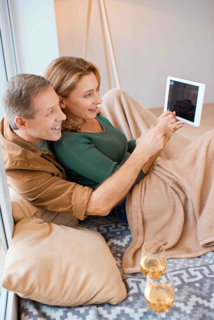 Happy couple with Flow Wellness sexual health treatment